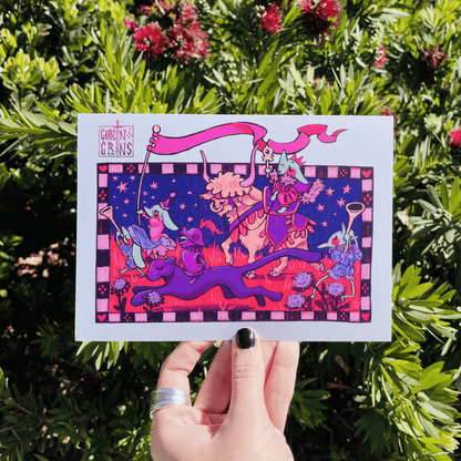 Colorful illustration of goblins and animals held up against a green leafy background